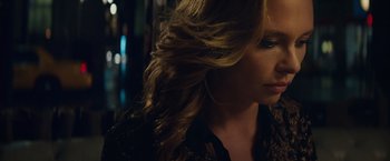 Movie still from “Molly's Game” (2017), directed by Aaron Sorkin – A person with long hair; Close Up shot, Low angle