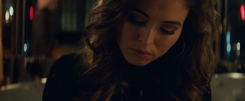 Movie still from “Molly's Game” (2017), directed by Aaron Sorkin – A person with long hair; Close Up shot, Low angle