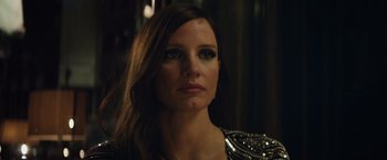 Movie still from “Molly's Game” (2017), directed by Aaron Sorkin – A person with long brown hair; Close Up shot, Low angle