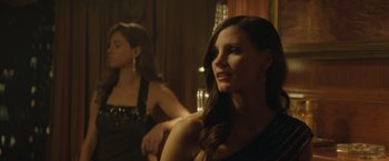 Movie still from “Molly's Game” (2017), directed by Aaron Sorkin – Two beautiful women sitting in front of a mirror; Close Up shot, Over the shoulder angle