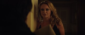 Movie still from “Molly's Game” (2017), directed by Aaron Sorkin – A woman looking at herself in the mirror; Close Up shot, Over the shoulder angle