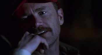 Movie still from “Monster” (2003), directed by Patty Jenkins – A person with a mustache; Close Up shot, Low angle