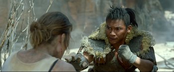 Movie still from “Monster Hunter” (2020), directed by Paul W.S. Anderson – A man and a woman are fighting each other; Close Up shot, Over the shoulder angle