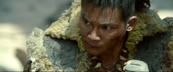 Movie still from “Monster Hunter” (2020), directed by Paul W.S. Anderson – A person wearing a fur coat; Close Up shot, Low angle