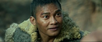 Movie still from “Monster Hunter” (2020), directed by Paul W.S. Anderson – A person wearing a fur coat; Close Up shot, Over the shoulder angle