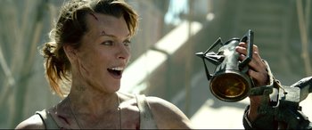 Movie still from “Monster Hunter” (2020), directed by Paul W.S. Anderson – A man with a knife in his mouth; Close Up shot, Low angle