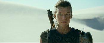 Movie still from “Monster Hunter” (2020), directed by Paul W.S. Anderson – Milla jovovich in a scene from the movie resident evil : the final chapter; Close Up shot, Low angle