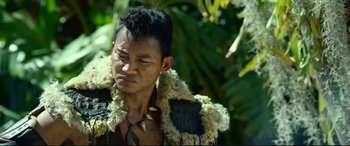 Movie still from “Monster Hunter” (2020), directed by Paul W.S. Anderson – A man with a fur coat and a mohawk haircut; Close Up shot, Over the shoulder angle