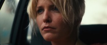 Movie still from “Monsters” (2010), directed by Gareth Edwards – A woman's face with blue eyes; Close Up shot, Low angle
