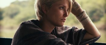 Movie still from “Monsters” (2010), directed by Gareth Edwards – A person with short blonde hair; Close Up shot, Low angle