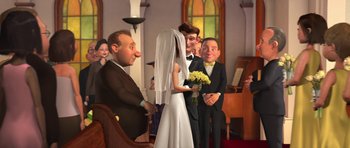 Movie still from “Monsters vs. Aliens” (2009), directed by Conrad Vernon – A cartoon of a bride and groom getting married in a church; Wide shot, High angle