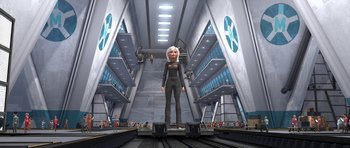 Movie still from “Monsters vs. Aliens” (2009), directed by Conrad Vernon – An animated woman standing on a platform in a building; Wide shot, Low angle