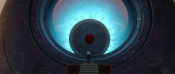 Movie still from “Monsters vs. Aliens” (2009), directed by Conrad Vernon – A man standing on a staircase in front of an eye; Extreme Wide shot, Overhead angle