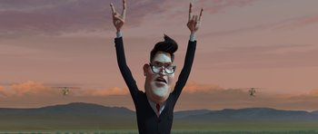 Movie still from “Monsters vs. Aliens” (2009), directed by Conrad Vernon – A cartoon of a man in a black suit and red neck tie; Medium shot, Low angle