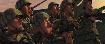 Movie still from “Monsters vs. Aliens” (2009), directed by Conrad Vernon – A group of soldiers in camouflage uniforms with guns in their hands; Wide shot, High angle