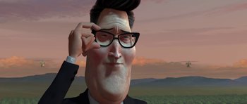 Movie still from “Monsters vs. Aliens” (2009), directed by Conrad Vernon – A man with a beard and glasses in a cartoon style; Extreme Close Up shot, Low angle