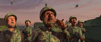Movie still from “Monsters vs. Aliens” (2009), directed by Conrad Vernon – An image of a cartoon soldier in a field with other soldiers; Medium shot, Low angle