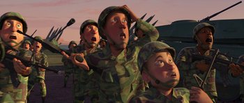 Movie still from “Monsters vs. Aliens” (2009), directed by Conrad Vernon – A group of people in military uniforms are looking up at the sky; Medium shot, High angle