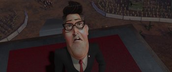 Movie still from “Monsters vs. Aliens” (2009), directed by Conrad Vernon – An animated man in a black suit and red tie; Close Up shot, Low angle