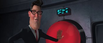 Movie still from “Monsters vs. Aliens” (2009), directed by Conrad Vernon – An animated man in a black suit and red tie; Close Up shot, Low angle