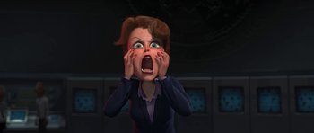 Movie still from “Monsters vs. Aliens” (2009), directed by Conrad Vernon – An animated woman with her mouth wide open and her eyes wide open; Medium shot, Low angle