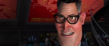 Movie still from “Monsters vs. Aliens” (2009), directed by Conrad Vernon – An animated man with glasses is looking at the camera; Close Up shot, Low angle