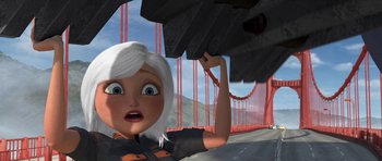 Movie still from “Monsters vs. Aliens” (2009), directed by Conrad Vernon – An animated woman holding an umbrella over a bridge; Medium shot, Low angle