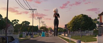 Movie still from “Monsters vs. Aliens” (2009), directed by Conrad Vernon – An animated woman standing on the side of the street; Wide shot, Low angle