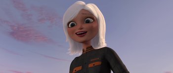 Movie still from “Monsters vs. Aliens” (2009), directed by Conrad Vernon – An animated woman with white hair is smiling for the camera; Close Up shot, Low angle