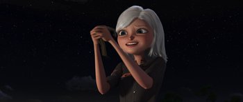 Movie still from “Monsters vs. Aliens” (2009), directed by Conrad Vernon – An animated woman holding something in her hand; Close Up shot, High angle