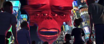 Movie still from “Monsters vs. Aliens” (2009), directed by Conrad Vernon – People are standing in front of a large red monkey face; Close Up shot, Low angle