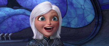 Movie still from “Monsters vs. Aliens” (2009), directed by Conrad Vernon – An animated woman with white hair is smiling for the camera; Close Up shot, Low angle