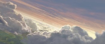 Movie still from “Monsters vs. Aliens” (2009), directed by Conrad Vernon – A plane flying in the sky above the clouds at sunset; Extreme Wide shot, Low angle