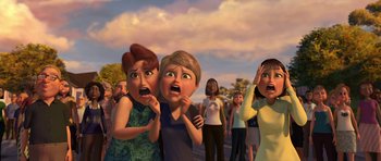 Movie still from “Monsters vs. Aliens” (2009), directed by Conrad Vernon – A group of people standing next to each other on a street; Medium shot, High angle