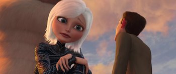 Movie still from “Monsters vs. Aliens” (2009), directed by Conrad Vernon – An animated woman with white hair is looking at a man; Close Up shot, Over the shoulder angle