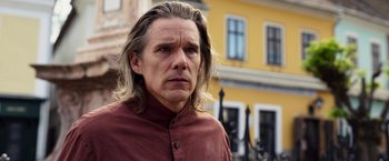 Movie still from “Moon Knight” (2022), directed by Mohamed Diab – A person with long hair; Close Up shot, Over the shoulder angle