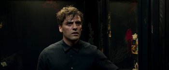 Movie still from “Moon Knight” (2022), directed by Mohamed Diab – A person wearing a black shirt; Close Up shot, Over the shoulder angle