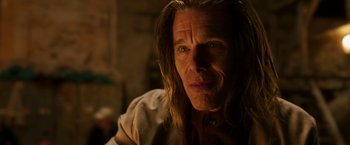 Movie still from “Moon Knight” (2022), directed by Mohamed Diab – A person with long hair; Close Up shot, Over the shoulder angle