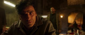 Movie still from “Moon Knight” (2022), directed by Mohamed Diab – A person wearing a jacket; Close Up shot, Over the shoulder angle