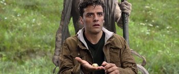 Movie still from “Moon Knight” (2022), directed by Mohamed Diab – A man holding an object in his hands; Close Up shot, Over the shoulder angle