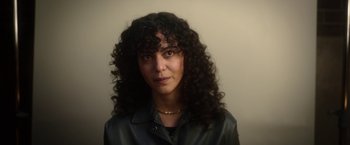 Movie still from “Moon Knight” (2022), directed by Mohamed Diab – A person with curly hair; Close Up shot, High angle