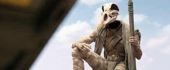 Movie still from “Moon Knight” (2022), directed by Mohamed Diab – A statue of a person wearing a mask; Medium shot, Low angle