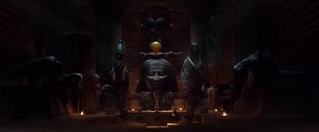 Movie still from “Moon Knight” (2022), directed by Mohamed Diab – An image of an egyptian temple with a statue in the middle of the room; Extreme Wide shot, Low angle