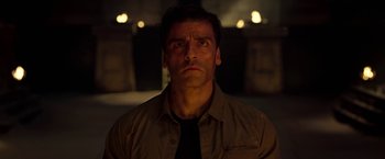 Movie still from “Moon Knight” (2022), directed by Mohamed Diab – A person wearing a shirt and a tie; Close Up shot, Low angle