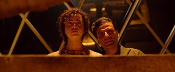 Movie still from “Moon Knight” (2022), directed by Mohamed Diab – A man and a woman standing next to each other; Close Up shot, Low angle