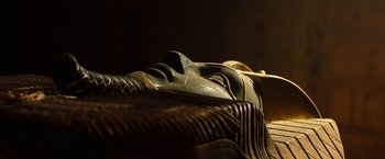 Movie still from “Moon Knight” (2022), directed by Mohamed Diab – The face of a statue; Extreme Close Up shot, High angle