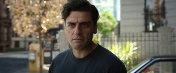 Movie still from “Moon Knight” (2022), directed by Mohamed Diab – A person wearing a black t - shirt; Close Up shot, Over the shoulder angle