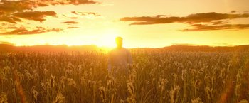 Movie still from “Moon Knight” (2022), directed by Mohamed Diab – A man standing in the middle of a field at sunset; Extreme Wide shot, Low angle