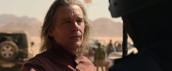 Movie still from “Moon Knight” (2022), directed by Mohamed Diab – A person with long white hair; Close Up shot, Over the shoulder angle