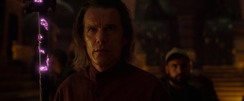 Movie still from “Moon Knight” (2022), directed by Mohamed Diab – A person with long hair; Close Up shot, Over the shoulder angle